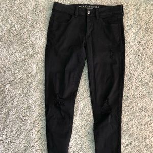 Black jeans with holes